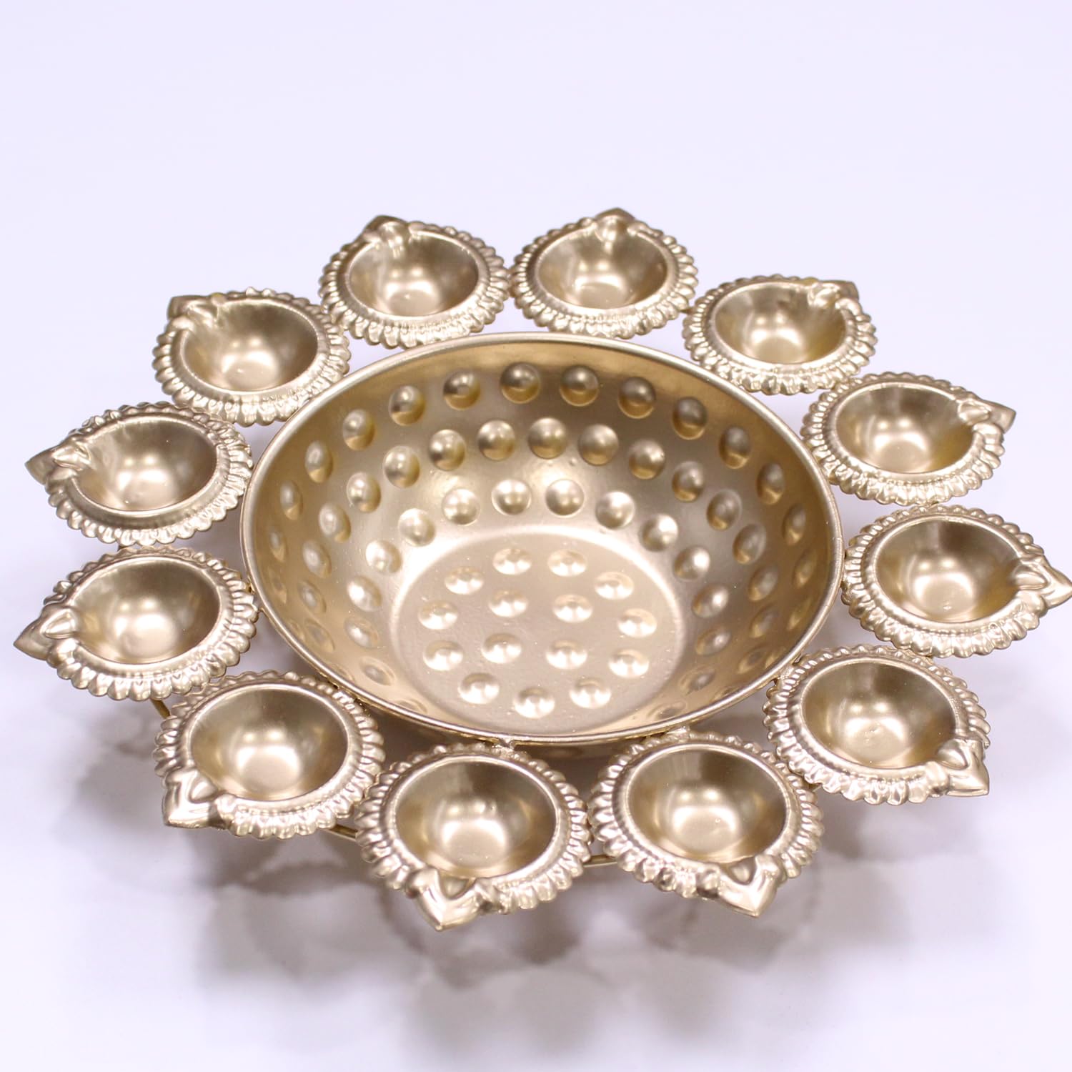 Tied Ribbons Urli Bowl with 12 Attached Oil Diyas for Floating Flowers and Tealight Candles