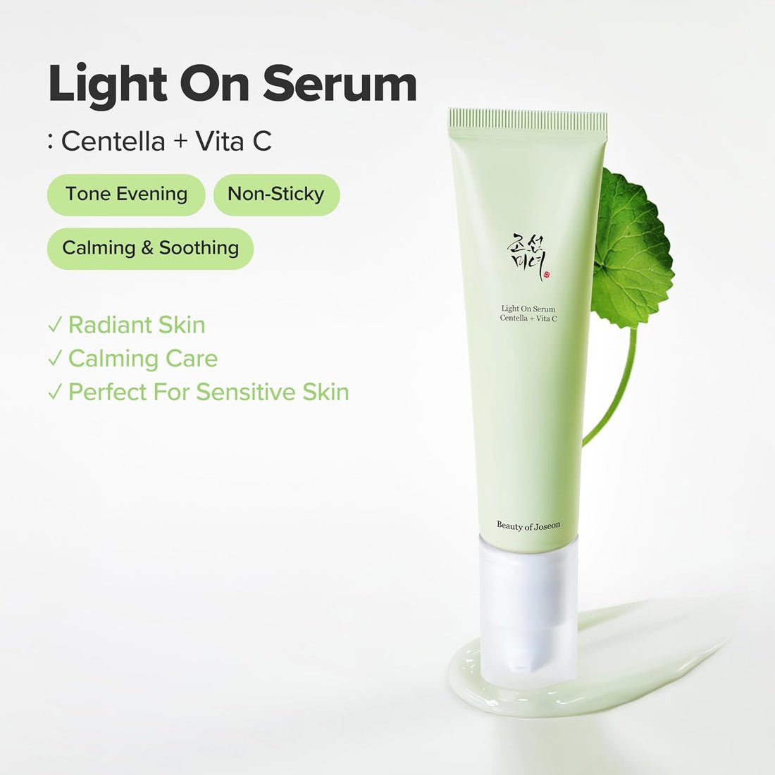 Skincare product with a green tube and bottle on a white background