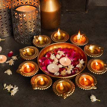Tied Ribbons Urli Bowl with 12 Attached Oil Diyas for Floating Flowers and Tealight Candles