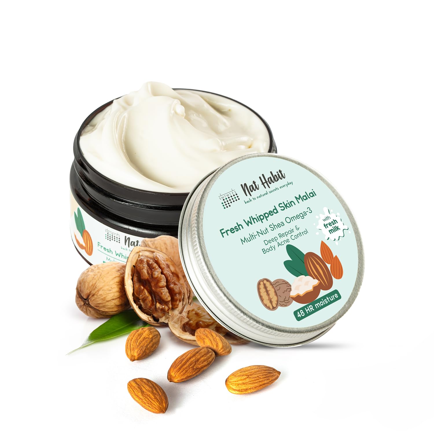 Jar of cream with almonds and walnuts on a white background