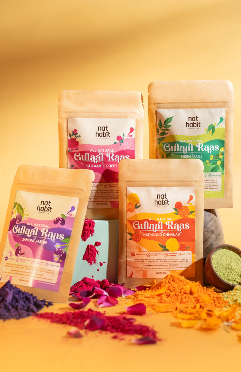 Assorted packages of 'nat habit' Gulalai Raps with colorful labels on a yellow background.